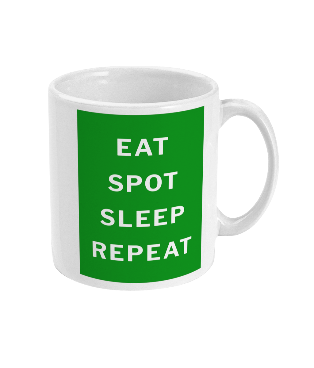 Eat, Spot, Sleep, Repeat lettering shown on the mug's green panel, side view
