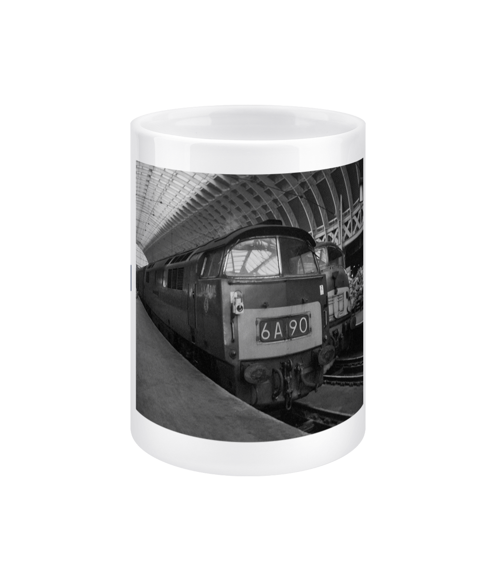 Western Memories 15oz white ceramic mug, front: Peter Collins's photograph of a Class 52 Western at the Paddington buffer stops in 1964.